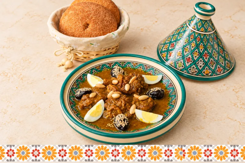 Beef with Plums Tagine - Moroccan slow-cooked beef at AMLO Doha Qatar